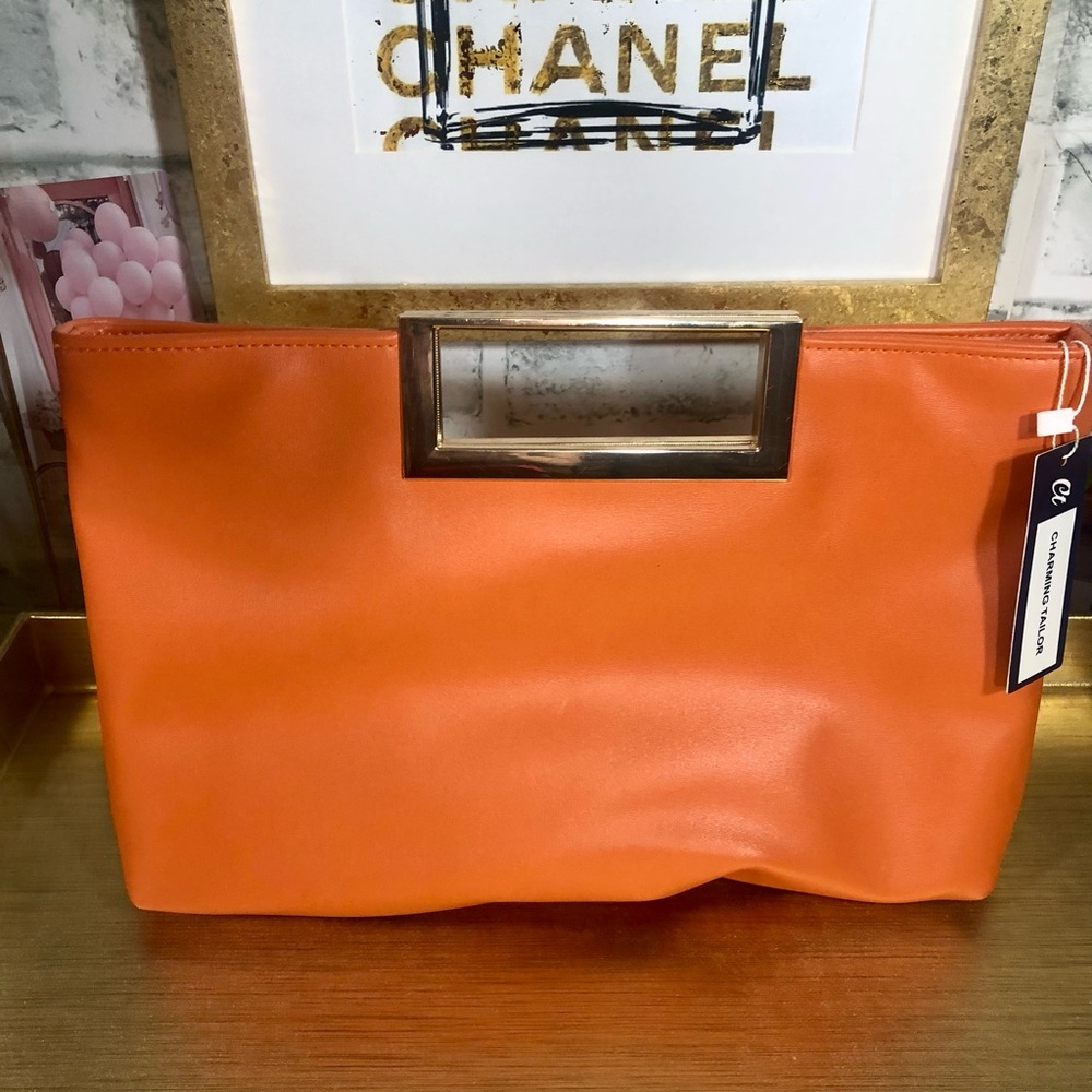 Charming Charlie Orange Clutch with Gold Handle Accent